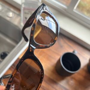 Ray-Ban sunglasses for sale. Minor scratch on one lens